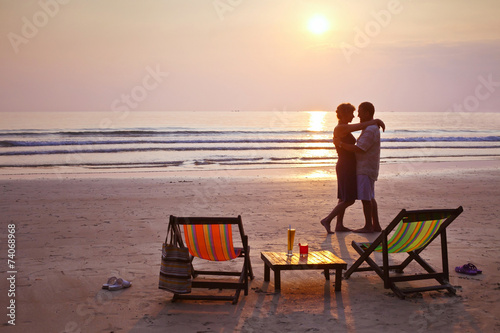 happy couple on the beach at sunset © Song_about_summer