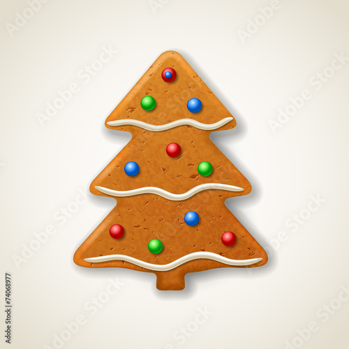 Christmas gingerbread fir-tree, decorated colored icing
