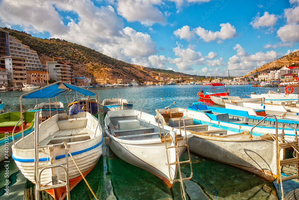 Boats in Balaklava Bay in the sunny summer day,  Crimea