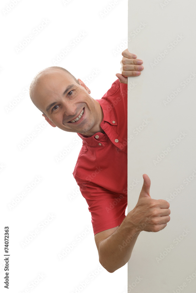 man peeking behind the blank poster man peeking behind the blank poster
