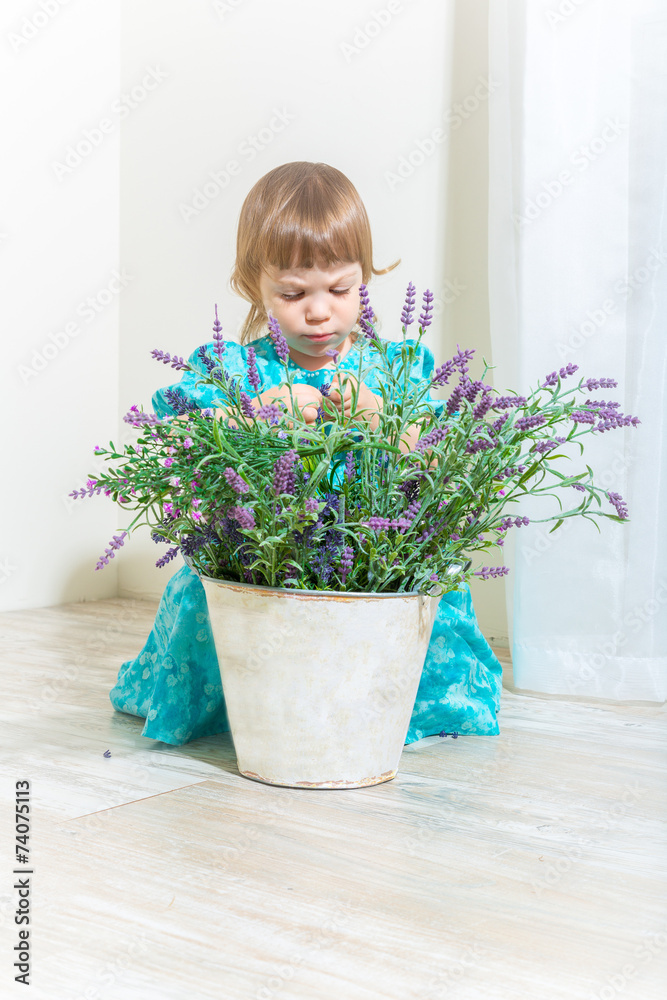 Cute girl with spring flowers Cute girl with spring flowers