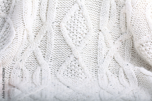 texture of white wool knit sweater homemade