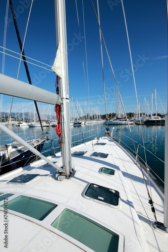 sail boat deck with windows in marina