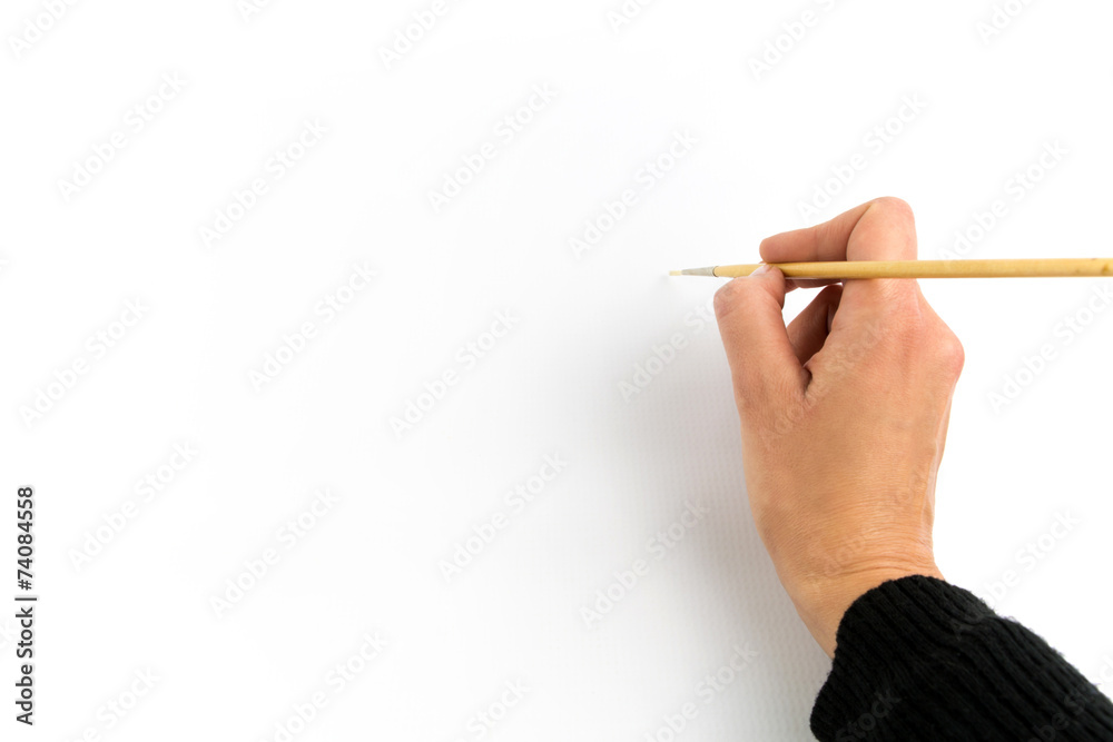Hand holding brush, isolated on white background Hand holding brush, isolated on white background