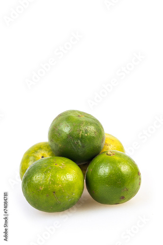 Limes on the white background