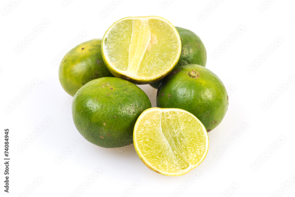 Limes on the white background