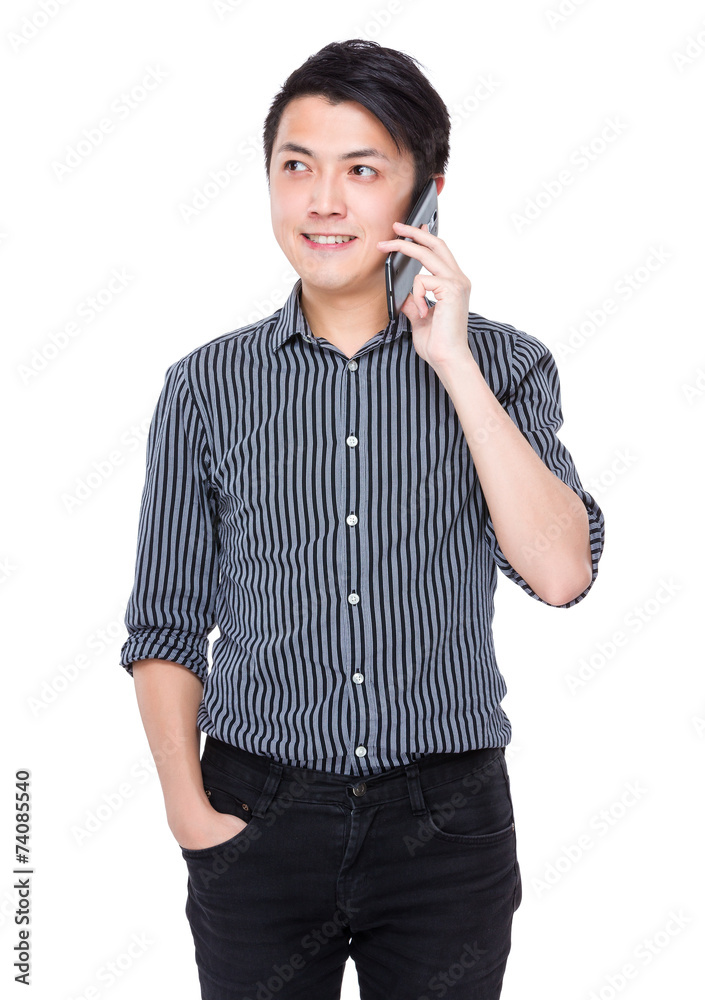 Young Businessman talk to cellphone Young Businessman talk to cellphone