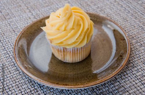 Cupcake with yellow cream
