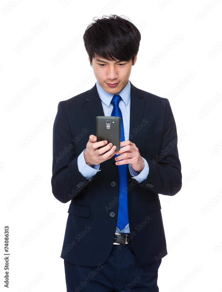 Businessman use of cellphone