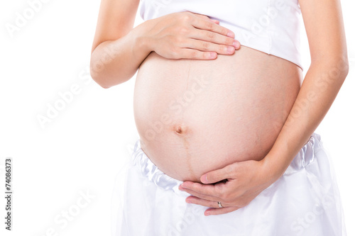 Pregnant woman with white background © leungchopan