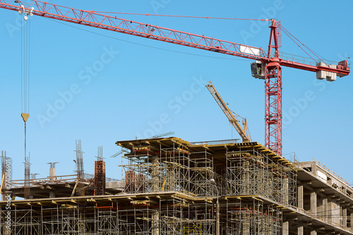 Building site with crane on sky background © genjok