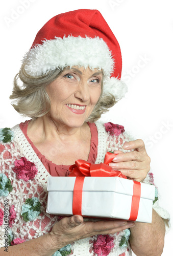 Senior woman in Santa Claus cap