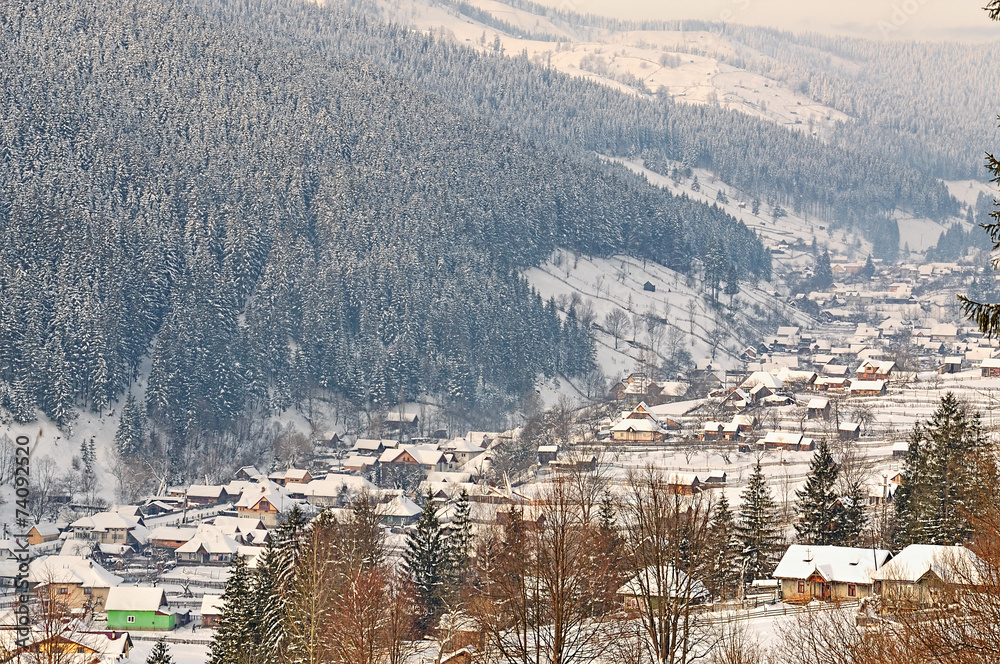 winter village landscape in Romania Carpathians