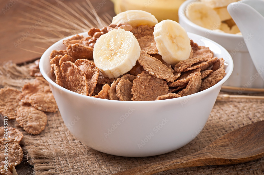 Fototapeta premium Healthy breakfast - whole grain muesli with a banana