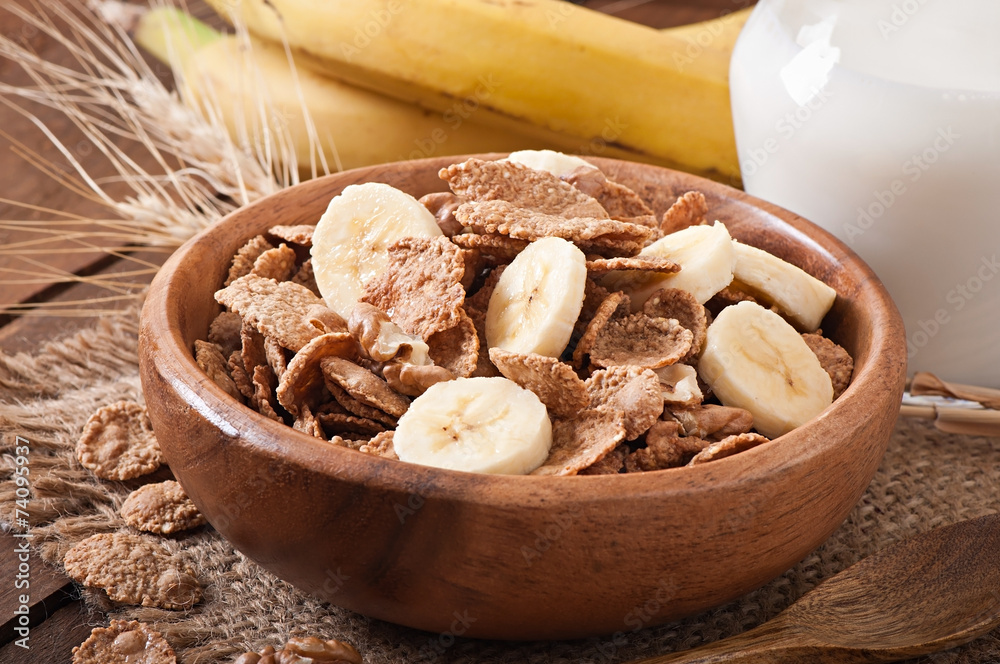 Healthy breakfast - whole grain muesli with a banana Healthy breakfast - whole grain muesli with a banana