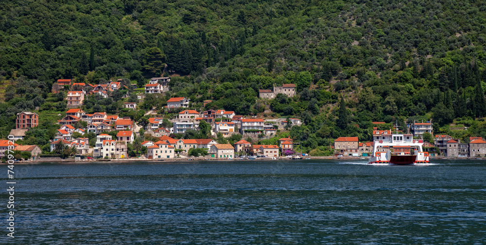View of Boka Kotorska with pier in Lepetance, Montenegro.