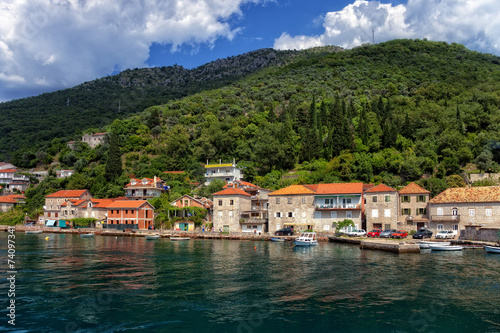 Fototapeta Naklejka Na Ścianę i Meble -  View of Boka Kotorska with pier in Lepetance, Montenegro.