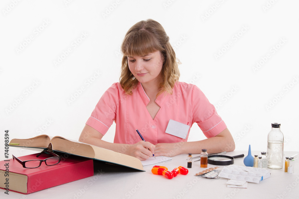Medical Students in class reading book Medical Students in class reading book