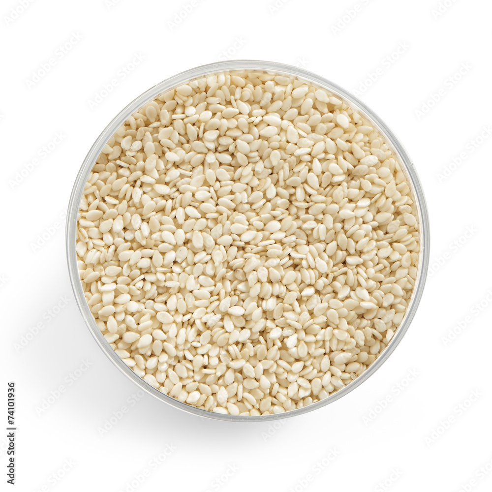 sesame seeds in a glass jar from above sesame seeds in a glass jar from above