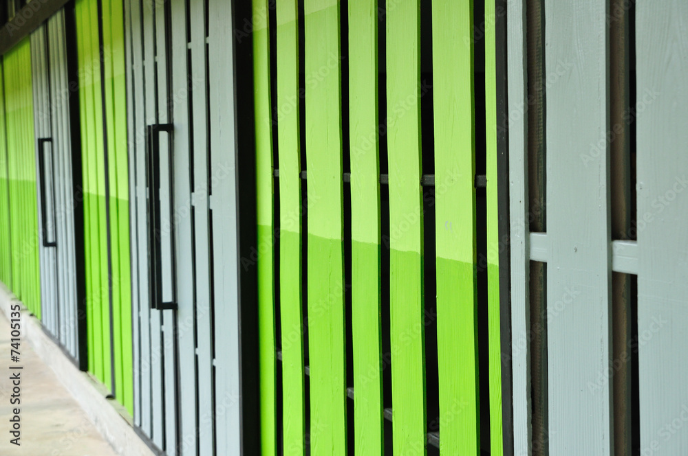 Warehouse gate closed, green and gray color Warehouse gate closed, green and gray color