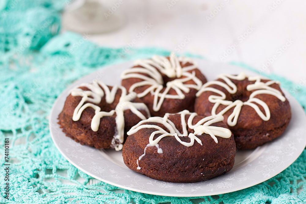 Chocolate donuts with white icing