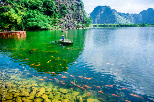 Beauty of landscape inside Trang An Natural Reserve, Ninh Binh, Vietnam photo