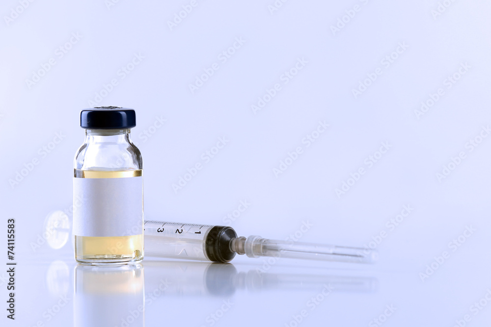 Vaccine in vial with syringe Vaccine in vial with syringe
