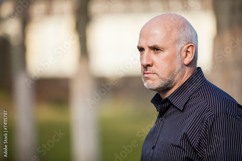 Confident attractive man standing waiting