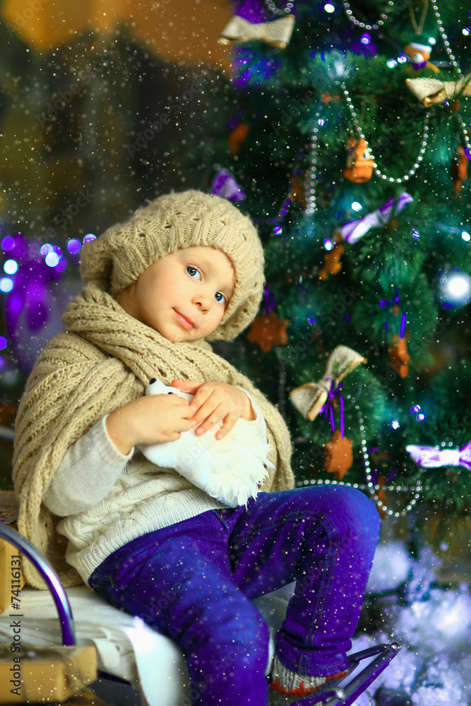 the girl near a Christmas fir-tree 3
