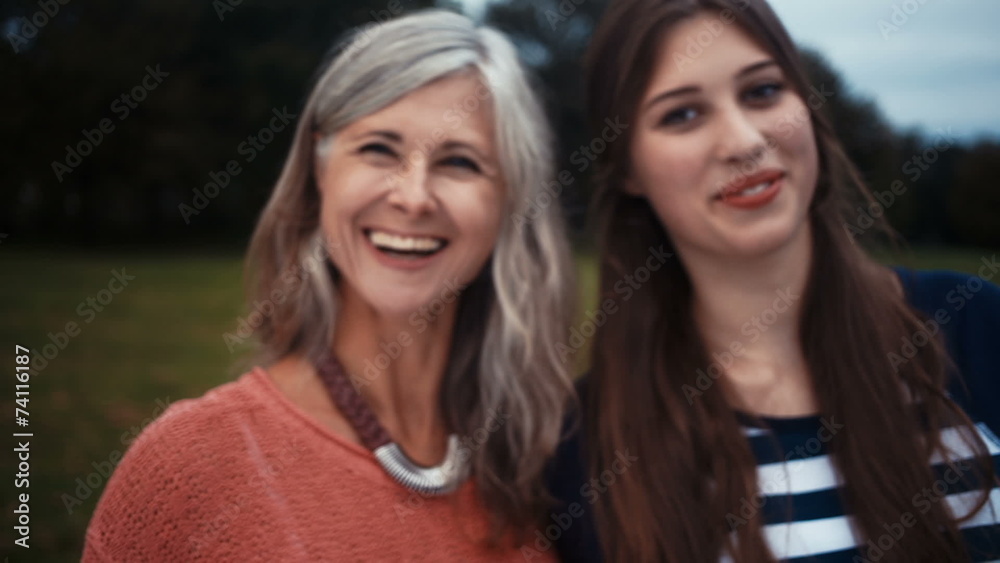 Mother and Daughter Show Heart With Their Hands Together Mother and Daughter Show Heart With Their Hands Together