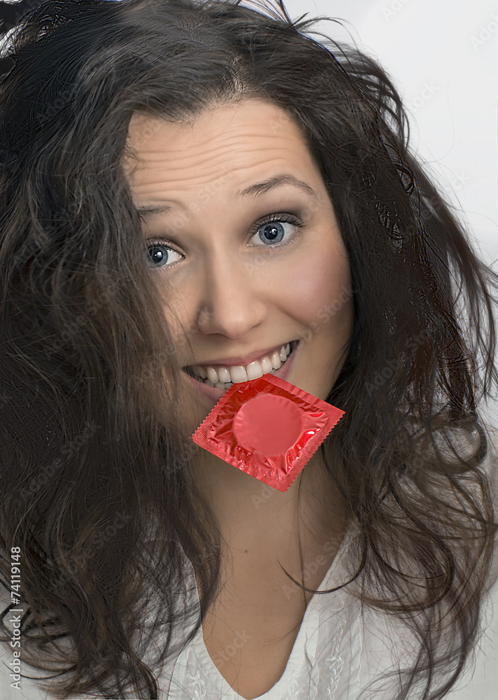 Girl with  with red condom pack