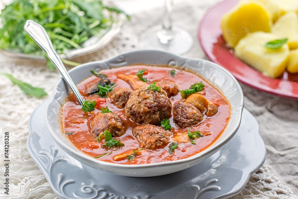 Meatballs albondigas in tomato sauce with mushrooms Meatballs albondigas in tomato sauce with mushrooms