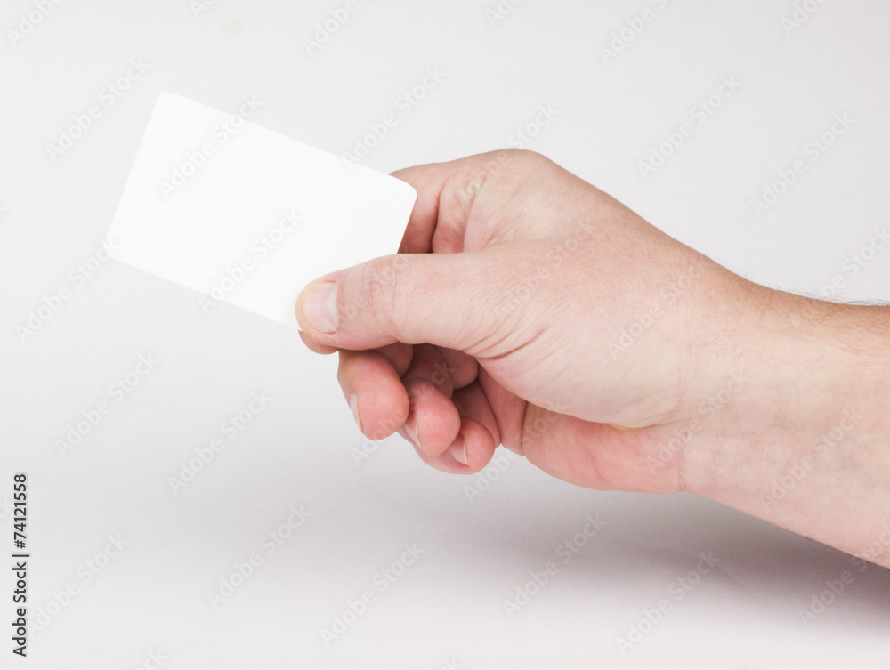 Hand with business card.