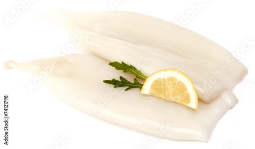 Squids decorated with sliced lemon isolated
