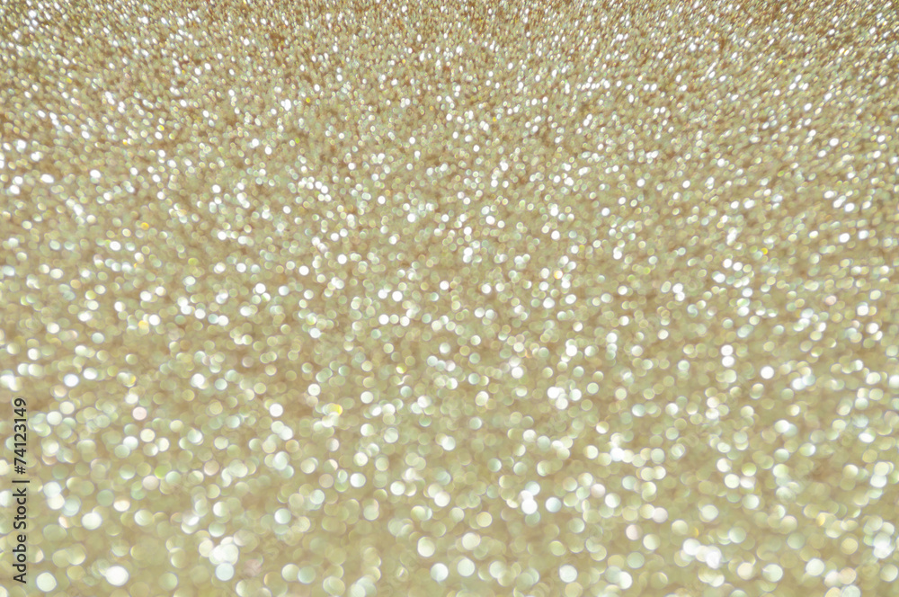 defocused abstract golden lights background defocused abstract golden lights background