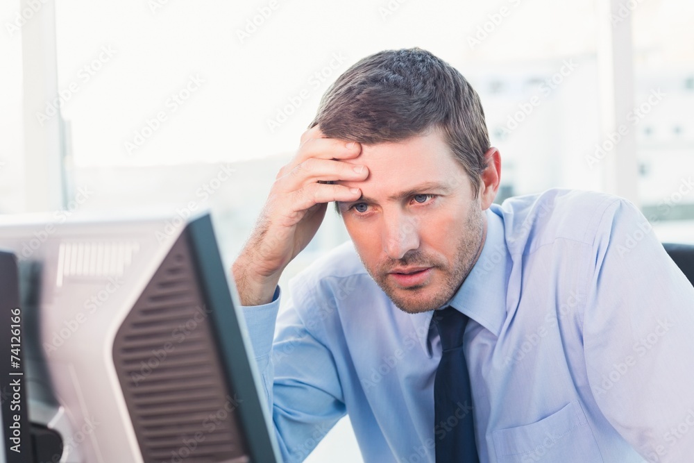 Fototapeta premium Concentrate businessman looking at his computer