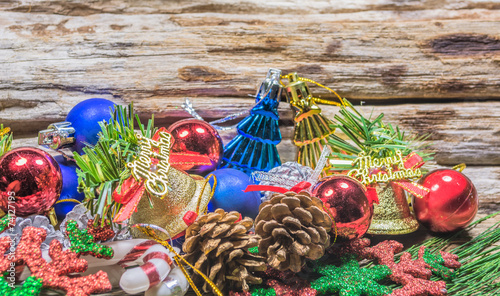 Chrismas baubles and vary of decoration on wood background