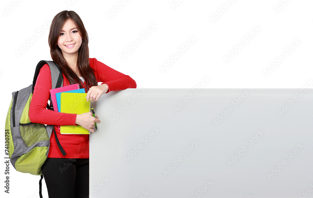 young asian student holding empty white board young asian student holding empty white board