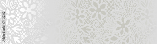 White lace with  flowers on the white background