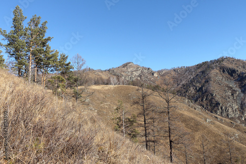 Mountain top against the blue sky