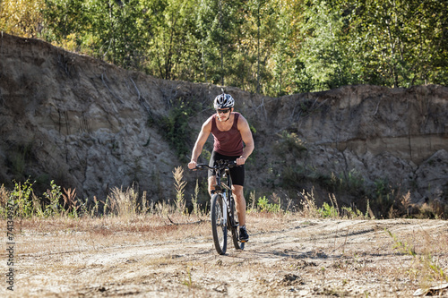 athlete man cycling on a bicycle