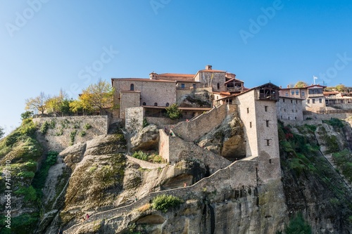 Stairway leading into a monastery build on a rock. © anzebizjan