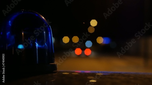 close-up of flashing light on a police car