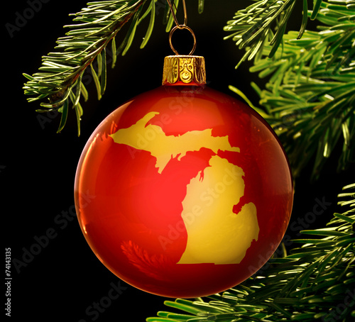 Red bauble with the golden shape of Michigan
