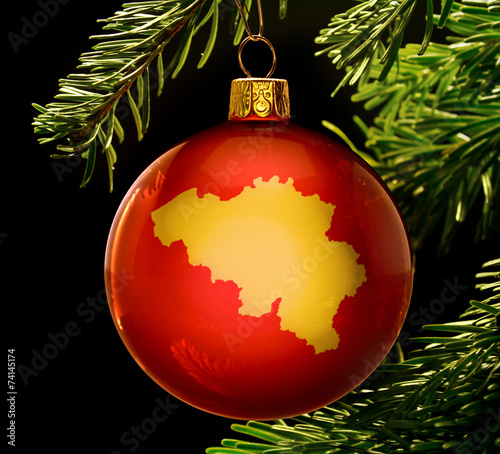 Red bauble with the golden shape of Belgium
