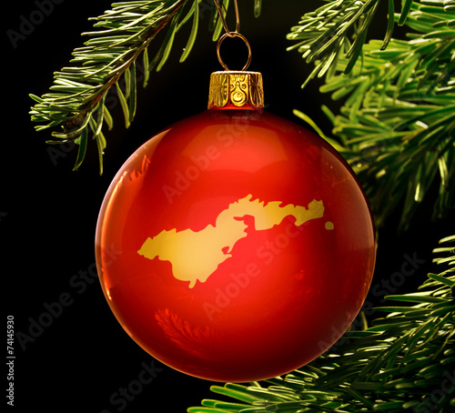 Red bauble with the golden shape of American Samoa
