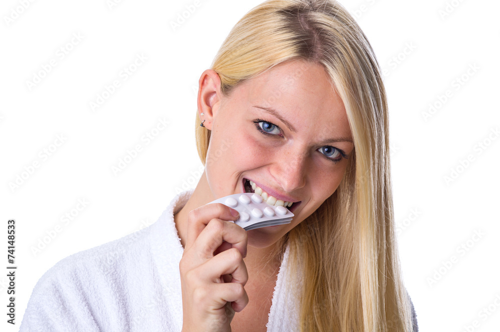 Frau mit Pillen