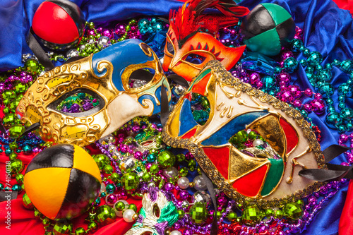 Three Mardi Gras Masks and Beads © toddphoto