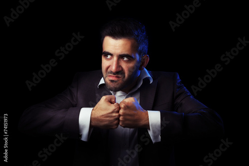 Business man in suit being angry
