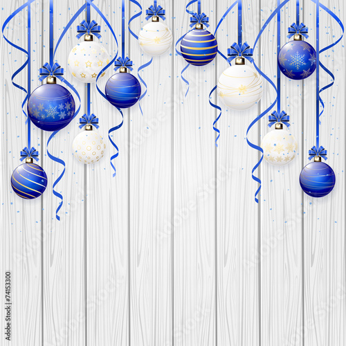 Blue Christmas balls on wooden background